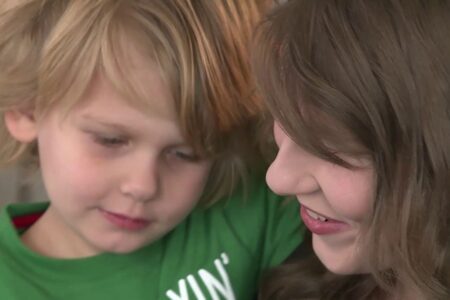 Parents of boy who lost hand in dog attack sue neighbors