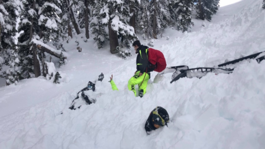 Utah snowmobiler survives avalanche that briefly buried him
