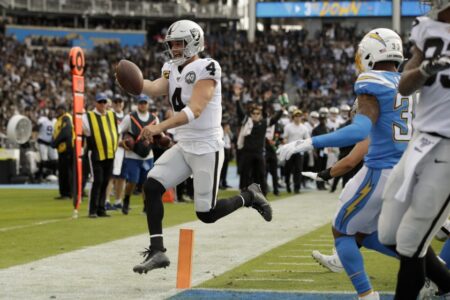 Raiders keep playoff hopes alive with victory over Chargers