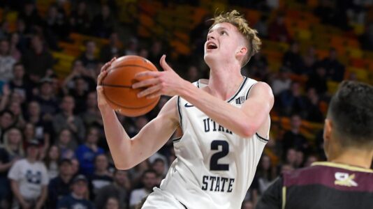 Utah State goes to 10-1, routs NAIA’s St. Katherine 94-49