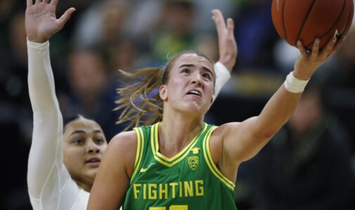 Oregon guard Sabrina Ionescu, front, drives to the rim for a basket past Colorado guard Lesila Finau late in the first half of an NCAA college basketball game Saturday, Feb. 1, 2020, in Boulder, Colo. (AP Photo/David Zalubowski)