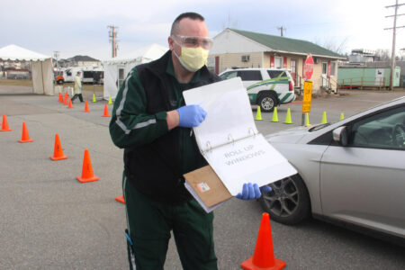 Chaos, inconsistency mark launch of drive-thru virus testing