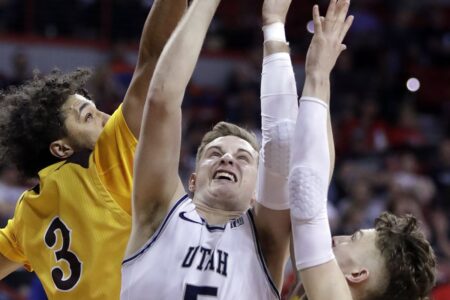 Merrill, Utah State, hold off Wyoming in MWC tourney semifinals