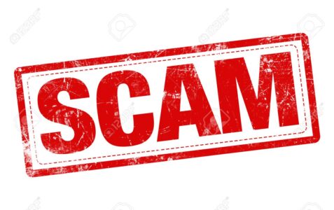 stamp word "Scam" in red over white background