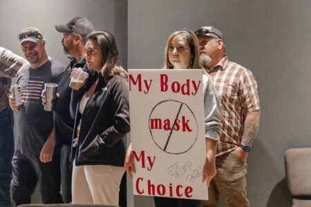 As mask rules get tighter in U.S. West, opposition gets loud