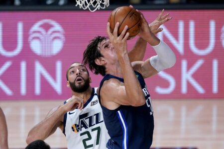 Short-handed Mavericks use huge rally to beat Jazz 122-114