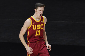 Southern California's Drew Peterson reacts after scoring a basket in the second half of an NCAA college basketball game against BYU, Tuesday, Dec. 1, 2020, in Uncasville, Conn. (AP Photo/Jessica Hill)