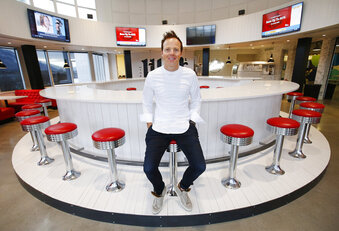FILE - In this Feb. 2, 2018, file photo, Qualtrics CEO Ryan Smith poses in the Hub at the company's headquarters in Orem, Utah. Survey-software provider Qualtrics went public Thursday, Jan. 28, 2021, two years after German software giant SAP bought the company for $8 billion, marking the latest achievement for a company that has become one of the crown jewels of a technology corridor near Salt Lake City that Utah likes to call "Silicon Slopes."  (Jeffrey D. Allred/The Deseret News via AP)