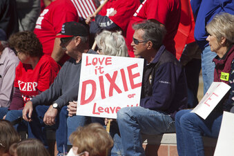 Protestors and counter-protestors gather at the Dixie State University campus to express opinions on the potential name change of the university Monday, March 1, 2021, in St. George, Utah. (Chris Caldwell /The Spectrum via AP)