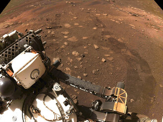 FILE - This March 4, 2021 file photo made available by NASA was taken during the first drive of the Perseverance rover on Mars. The Perseverance rover has been on Mars for a month, collecting data and making discoveries with each passing day. A number of the findings, through a collaboration with NASA, have been catalogued in Diné Bizaad, the Navajo language. (NASA/JPL-Caltech via AP, File)