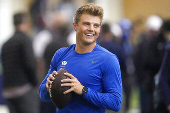 BYU quarterback Zach Wilson warms up before participating in the school's pro day football workout for NFL scouts Friday, March 26, 2021, in Provo, Utah. (AP Photo/Rick Bowmer)