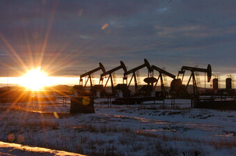 FILE - This Jan. 14, 2015 file photo shows oil pump jacks in McKenzie County in western North Dakota. President Joe Biden shut down oil and gas lease sales from the nation's vast public lands and waters in his first days in office, citing worries about climate change. Now his administration has to figure out what do with the multi-billion dollar program without crushing a significant sector of the U.S. economy, while fending off sharp criticism from congressional Republicans and the oil industry. (AP Photo/Matthew Brown, File)
