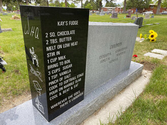 A headstone displays a recipe for Kay's Fudge in the Logan Cemetery, on May 25, 2021, in Logan, Utah. The headstone which is gaining notoriety around the world thanks to photos posted online. Aside from birth and death dates for Wade and Kathryn Andrews, the headstone displays a recipe for Kay's Fudge, Fox13-KSTU reported. (Todd Tanner/Fox13-KSTU via AP)
