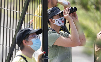 Tracy Aviary and member of the pride community host a guided bird walk for LGBTQIA+ folks and allies along the Jordan River on Saturday, May 15, 2021. (Francisco Kjolseth/The Salt Lake Tribune via AP)