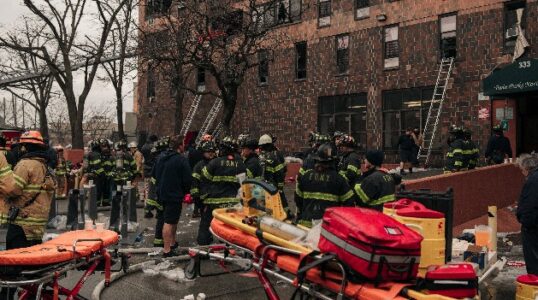 Open door allowed smoke to spread throughout building in deadly fire, New York City mayor says