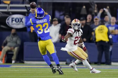 Short-handed 49ers stop Rams on downs in overtime, preserving a 26-23 victory