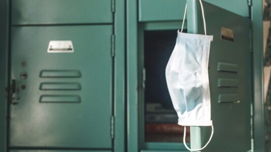 Schools turn to parents for help as omicron surge causes staff shortages