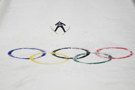 Austria wins Olympic gold in ski jumping team event
