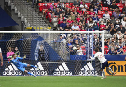 Vancouver Whitecaps' Ryan Gauld, right, scores on a penalty kick against Real Salt Lake goalkeeper Zac MacMath during the second half of an MLS soccer match Saturday, June 4, 2022, in Vancouver, British Columbia. (Darryl Dyck/The Canadian Press via AP)