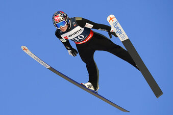 FILE - Norway's Marius Lindvik competes during the World Cup ski jumping in Vikersundbakken, Norway, Saturday March 12, 2022. Ski jumping governing bodies from the United States and Norway have forged an unprecedented partnership. USA Nordic Sport and Norges Hopplandslaget announced Wednesday, Aug. 24, 2022, that their national ski jumping teams will share coaches and training facilities as part of a four-year agreement.(Terje Bendiksby/NTB via AP, File)