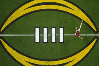 FILE - Alabama's James Burnip warms up before the College Football Playoff championship football game against Georgia on Jan. 10, 2022, in Indianapolis. The university presidents who oversee the College Football Playoff are scheduled to meet Friday, Sept. 2, 2022, to discuss expanding the four-team format, re-opening the possibility that a new model for crowning a champion could be implemented as soon as the 2024 season. (AP Photo/Charlie Riedel, File)