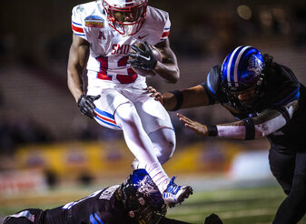 SMU's Roderick Daniels, Jr. (13) dodges the BYU defense and runs in for the touchdown during the first half of the New Mexico Bowl NCAA college football game in Albuquerque, N.M., Saturday, Dec. 17, 2022. (Chancey Bush/The Albuquerque Journal via AP)