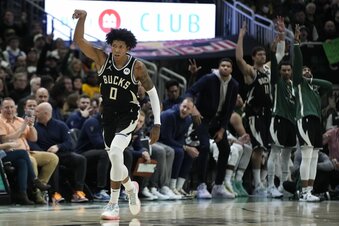 Milwaukee Bucks' MarJon Beauchamp reacts after making a three pointer during the second half of an NBA basketball game against the Utah Jazz Saturday, Dec. 17, 2022, in Milwaukee. The Bucks won 123-97. (AP Photo/Morry Gash)