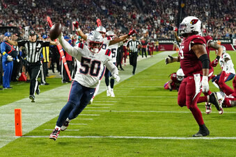 New England Patriots linebacker Raekwon McMillan (50) celebrates after recovering a fumble to score a touchdown against the Arizona Cardinals during the second half of an NFL football game, Monday, Dec. 12, 2022, in Glendale, Ariz. (AP Photo/Ross D. Franklin)