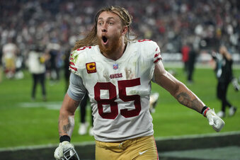 San Francisco 49ers tight end George Kittle (85) celebrates after their victory over the Las Vegas Raiders in an NFL football game between the San Francisco 49ers and Las Vegas Raiders, Sunday, Jan. 1, 2023, in Las Vegas. The 49ers defeated the Raiders 37-34 in overtime. (AP Photo/John Locher)