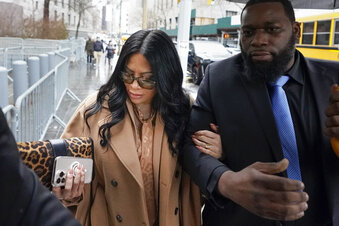 Jennifer Shah arrives to federal court in New York, Friday, Jan. 6, 2023. Federal prosecutors are seeking a 10-year prison sentence for the member of "The Real Housewives of Salt Lake City" who they say lived lavishly after defrauding thousands of people nationwide in a telemarketing scam, many of them elderly. (AP Photo/Seth Wenig)