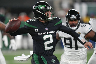 New York Jets quarterback Zach Wilson (2) passes against the Jacksonville Jaguars during the first quarter of an NFL football game, Thursday, Dec. 22, 2022, in East Rutherford, N.J. (AP Photo/Seth Wenig)