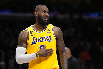 Los Angeles Lakers forward LeBron James smiles during the second half of an NBA basketball game against the San Antonio Spurs Wednesday, Jan. 25, 2023, in Los Angeles. (AP Photo/Mark J. Terrill)