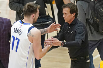 Utah Jazz head coach Quin Snyder, right, greets Dallas Mavericks' Luka Doncic (77)  in Game 6 of an NBA basketball first-round playoff series, April 28, 2022, in Salt Lake City. Snyder was the director of a Basketball Africa League Combine in Paris this week. It was his first on-court job since stepping down as Jazz coach last spring (AP Photo/Rick Bowmer, file)