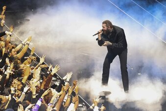 Post Malone performs before the NBA basketball All-Star game Sunday, Feb. 19, 2023, in Salt Lake City. (AP Photo/Rob Gray)