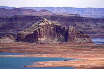 FILE - Low water levels at Wahweap Bay at Lake Powell along the Upper Colorado River Basin are shown, June 9, 2021, at the Utah and Arizona border at Wahweap, Ariz. The Biden administration announced Thursday, Feb. 2, 2023, that 15 Native American tribes will get a total of $580 million in federal money this year for water rights settlements. (AP Photo/Ross D. Franklin, File)