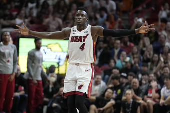 Miami Heat guard Victor Oladipo (4) reacts after sinking a 3-point basket during the first half of an NBA basketball game against the Utah Jazz, Monday, March 13, 2023, in Miami. (AP Photo/Rebecca Blackwell)