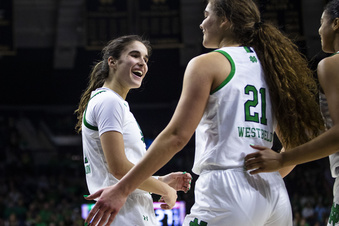 Notre Dame's Sonia Citron, left, celebrates with Maddy Westbeld (21) during the second half of a first-round college basketball game against Southern Utah in the NCAA Tournament, Friday, March 17, 2023, in South Bend, Ind. (AP Photo/Michael Caterina)