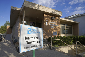 FILE - A sign is shown in front of Planned Parenthood of Utah Tuesday, June 28, 2022, in Salt Lake City. Utah Gov. Spencer Cox signed legislation on Wednesday, March 15, 2023, that will effectively ban clinics from providing abortions, setting off a rush of confusion among clinics, hospitals and prospective patients in the deeply Republican state. With the law set to start taking effect May 3, both the Planned Parenthood Association of Utah and the Utah Hospital Association declined to detail how the increasingly fraught legal landscape for abortion providers in Utah will affect their operations.  (AP Photo/Rick Bowmer, File)