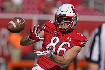 FILE - Utah tight end Dalton Kincaid (86) warms up before their NCAA college football game against Oregon State Saturday, Oct. 1, 2022, in Salt Lake City. This year’s draft class features an abundance of tight ends, and some are even calling it better than the bumper crop of 2017. “The tight end group is the best I’ve seen in the last 10 years,” NFL Network analyst Daniel Jeremiah proclaimed. (AP Photo/Rick Bowmer, File)