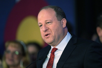 FILE - Colorado Gov. Jared Polis speaks on Nov. 8, 2022, in downtown Denver. Polis is scheduled to sign a set of health care bills Friday, April 14, 2023, that enshrine protections for abortion and gender-affirming care procedures and medications. (AP Photo/David Zalubowski, File)