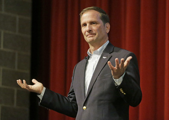FILE - Republican U.S. Rep. Chris Stewart looks on during his town hall meeting on March 31, 2017, in Salt Lake City. Stewart is resigning from his seat in the narrowly divided U.S. House of Representatives. He said in a statement on Wednesday, May 31, 2023, that he had decided to retire due to his wife's health. (AP Photo/Rick Bowmer, File)