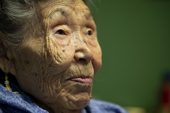 FILE - Lizzie Chimiugak looks on at her home on Monday, Jan. 20, 2020, in Toksook Bay, Alaska. Chimiugak, who turned 90 years old on Monday, is scheduled to be the first person counted in the 2020 U.S. Census on Tuesday. The share of seniors age 65 or older in the U.S. grew by more than a third, while the share of children declined, particularly among those under age 5, according to new figures from the 2020 census released Thursday, May 25, 2023. (AP Photo/Gregory Bull, File)