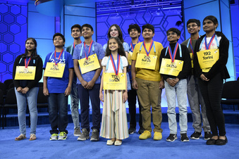 The 11 finalists for the Scripps National Spelling Bee pose for a picture after the day's competition, Wednesday, May 31, 2023, in Oxon Hill, Md. Left to right-Shradha Rachamreddy, 13, from San Jose, Calif., Aryan Khedkar, 12, from Rochester, Hills Mich., Arth Dalsania, 14, from Camarillo, Calif., Pranav Anandh, 14, from Glen Mills, Pa., Sarah Fernandes, 11, from Omaha, Neb., Charlotte Walsh, 14, from Arlington, Va., Dev Shah, 14, from Largo, Fla., Surya Kapu, 14, from South Jordan, Utah, Dhruv Subramanian, 12, from San Ramon, Calif., Vikrant Chintanaboina, 14, from San Jose, Calif., and Tarini Nandakumar, 12, from Round Rock, Texas. (AP Photo/Nick Wass)