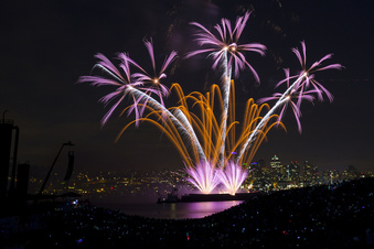 FILE - Fireworks explode over Lake Union during the Seafair Summer Fourth event, July 4, 2013, as seen from Gas Works Park in Seattle, Wash.  Extremely hot, dry conditions forecast through the Fourth of July across much of the West are heightening concerns about wildfires and the dangers of fireworks. (Jordan Stead/seattlepi.com via AP, File)