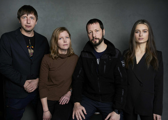 FILE - Photographer Evgeniy Maloletka, from left, "Frontline" producer/editor Michelle Mizner, director Mstyslav Chernov, and field producer Vasilisa Stepanenko pose for a portrait to promote the film "20 Days in Mariupol" at the Latinx House during the Sundance Film Festival on Sunday, Jan. 22, 2023, in Park City, Utah. The film, a joint project between The Associated Press and PBS "Frontline," is coming to a handful of theaters around the U.S. in July, starting with New York and Chicago this Friday. (Photo by Taylor Jewell/Invision/AP, File)