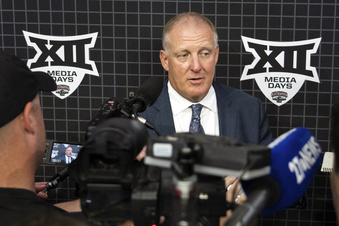 Kansas State head coach Chris Klieman answers questions at the NCAA college Big 12 Media Days in Arlington, Texas, Thursday, July 13, 2023. (Sara Diggins/Austin American-Statesman via AP)