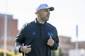 This photo provided by UCLA shows NCAA college football defensive coordinator D'Anton Lynn during practice in Los Angeles Aug. 9, 2023. Lynn is part of a number of coordinators who are doing well in their first season in the Pac-12.(UCLA via AP)