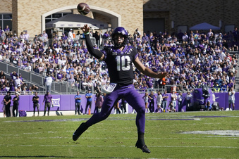 TCU quarterback Josh Hoover finds open field to pass during the first half of an NCAA college football game against BYU, Saturday, Oct. 14, 2023, in Fort Worth, Texas. (AP Photo/LM Otero)