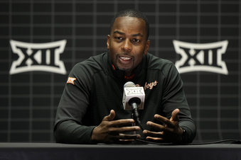 Oklahoma State coach Mike Boynton addresses the media during the NCAA college Big 12 men's basketball media day Wednesday, Oct. 18, 2023, in Kansas City, Mo. (AP Photo/Charlie Riedel)