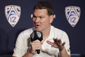 Arizona head coach Tommy Lloyd speaks during a news conference at the Pac-12 Conference NCAA college basketball media day Wednesday, Oct. 11, 2023, in Las Vegas. (AP Photo/John Locher)